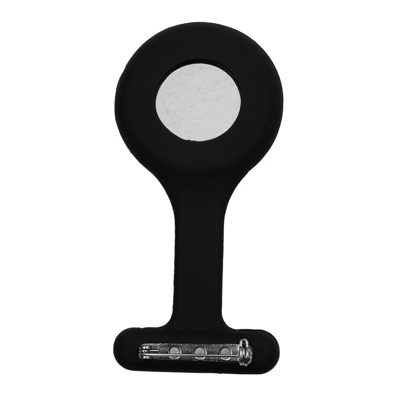 Reloj gmd color negro, con carcasa de silicona en forma de “T”. En la parte superior presenta una tapa metálica circular de color plateado y en la parte inferior un broche para sujetarlo.. Haga clic para ampliar la imagen