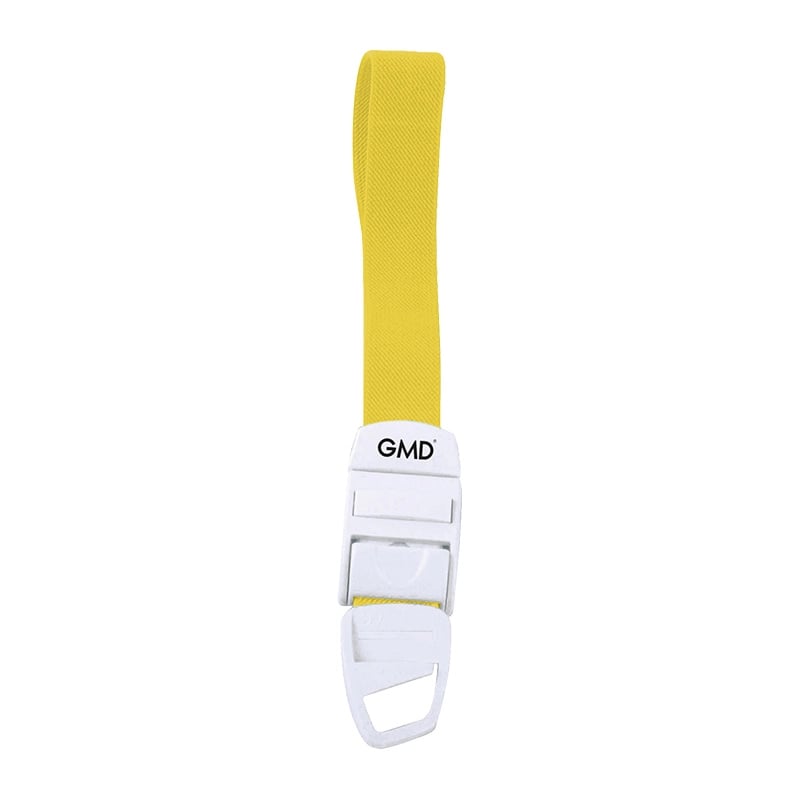 Torniquete gmd color amarillo, fabricado en material elástico tipo látex y poliéster; cuenta con un sistema de broche de seguridad y liberación rápida de color blanco, elaborado en material plástico.. Haga clic para ampliar la imagen