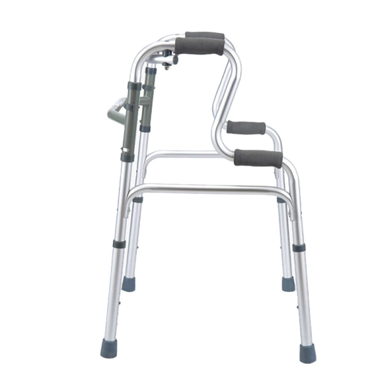 Caminador stand up doble función color gris, vista lateral derecha, estructura metálica. En la parte superior mangos de agarre grises a ambos lados y barras de soporte: una superior con estructura gris central, una barra en el centro y dos laterales en la. Haga clic para ampliar la imagen