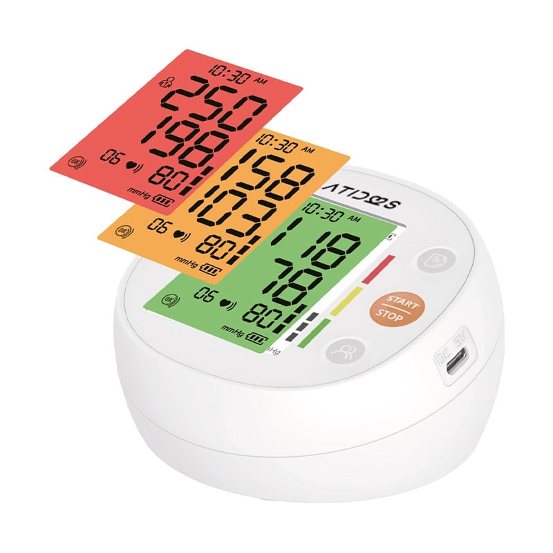 Monitor de Presión Arterial con Altavoz Latidos, vista lateral derecha, de forma semiovalada y color blanco, con botones ubicados en el lateral derecho. Presenta adaptador de puerto DC 5V y pantalla LCD de color rojo, naranja y verde, con dígitos en color. Haga clic para ampliar la imagen