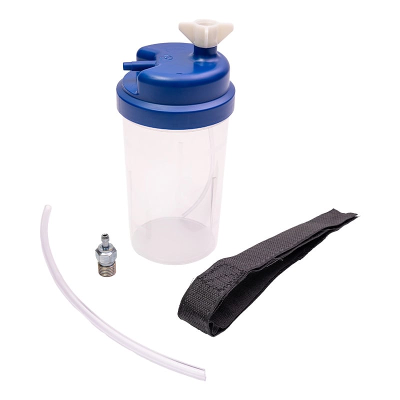 Kit 1 con cilindro de 680 lt, humidificador cilíndrico transparente con tapa azul y adaptador blanco en la parte superior. Alrededor pieza metálica plateada para ajuste, manguera transparente y tira negra para el agarre.. Haga clic para ampliar la imagen