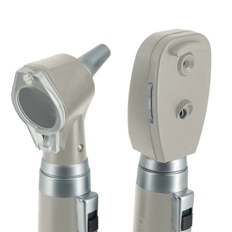 Kit de órganos y sentidos con fibra óptica gmd 2 bases 2 cabezales, blanco, vista lateral, en el lado izquierdo cabezal redondo con lupa transparente y una punta gris para introducir en el oído. En el lado derecho cabezal rectangular con lente de observac. Haga clic para ampliar la imagen