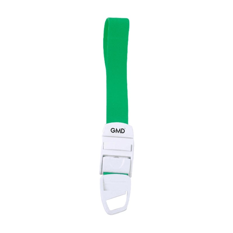 Torniquete gmd color verde, fabricado en material elástico tipo látex y poliéster; cuenta con un sistema de broche de seguridad y liberación rápida de color blanco, elaborado en material plástico.. Haga clic para ampliar la imagen