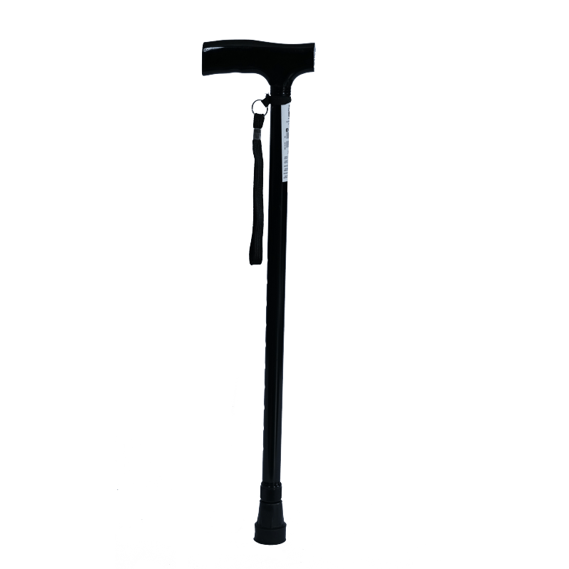 Baston con empuñadura en t ergonomico color negro, estructura metálica negra. En la parte superior empuñadura, debajo correa de mano negra y al lado etiqueta blanca con información en color negro. En la parte inferior base con goma antideslizante negra.. Haga clic para ampliar la imagen